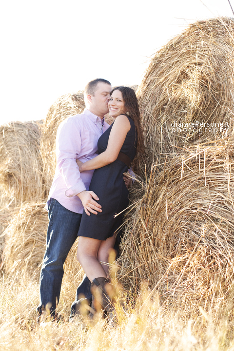 engagement session with hay bails