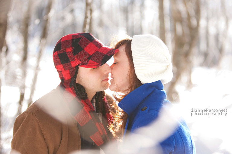 winter and snow engagement photos in boone nc