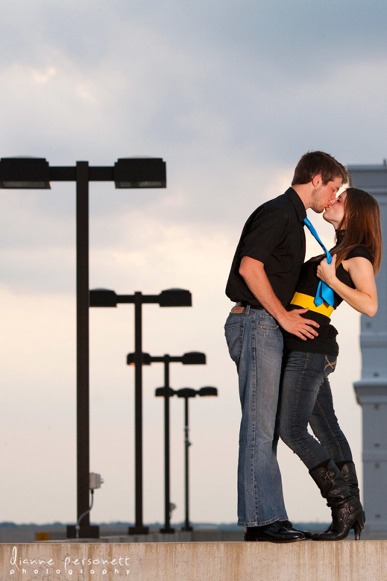 Engagement photos with a city/urban feel in Charlotte on parking deck