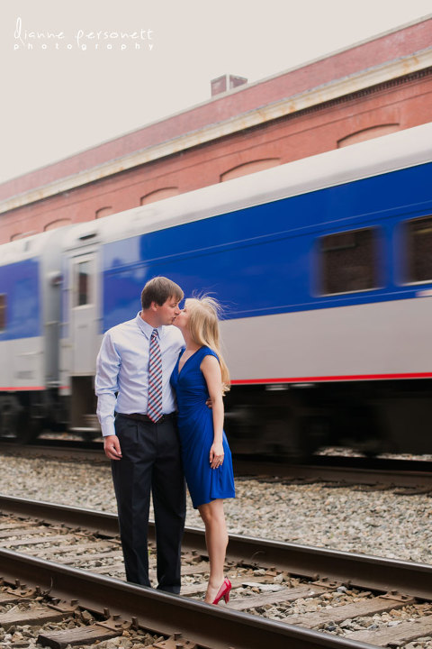 downtown Greensboro NC engagement photos with train tracks
