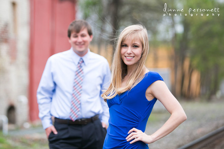 downtown Greensboro NC engagement photos with train tracks