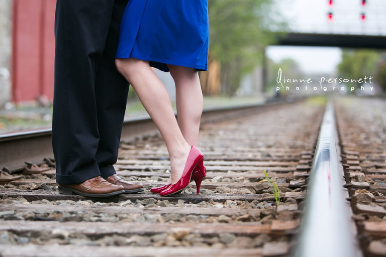 downtown Greensboro NC engagement photos with train tracks