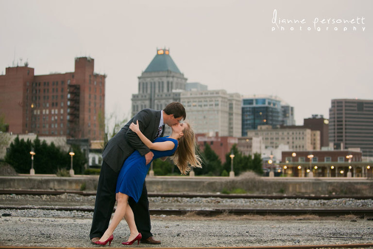 downtown greensboro skyline engagement photos