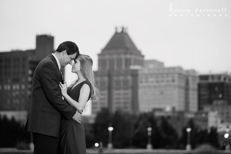 downtown greensboro nc engagement photos with greensboro skyline