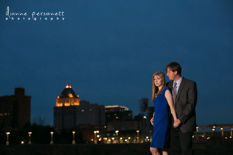 downtown greensboro nc engagement photos with greensboro skyline