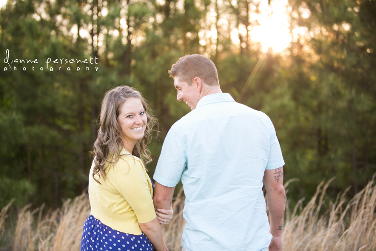 engagement photos in a field in charlotte