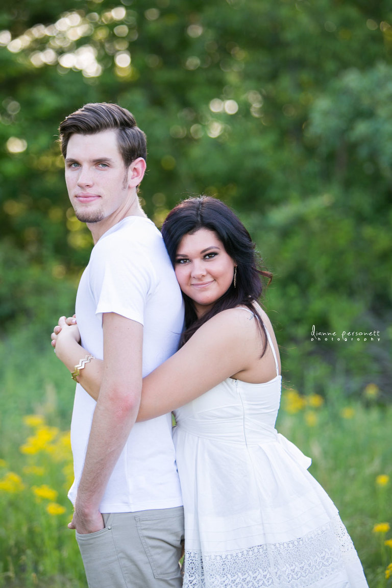 charlotte engagement photos in a flower field