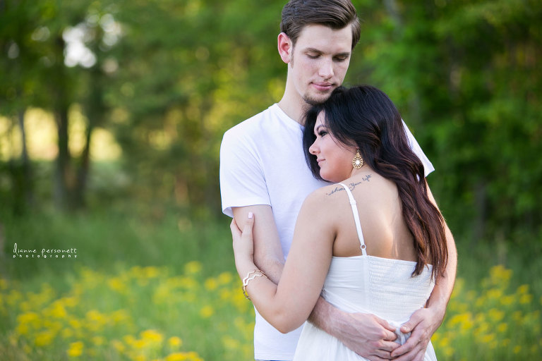 charlotte engagement photos in a flower field