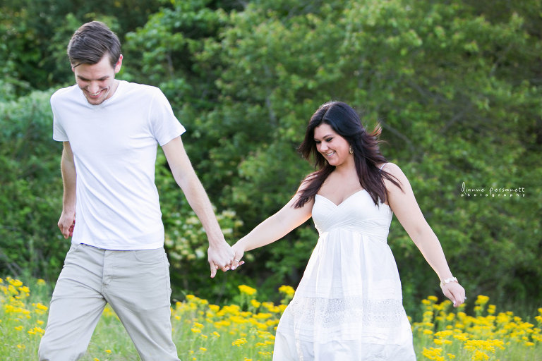 charlotte engagement photos in a flower field