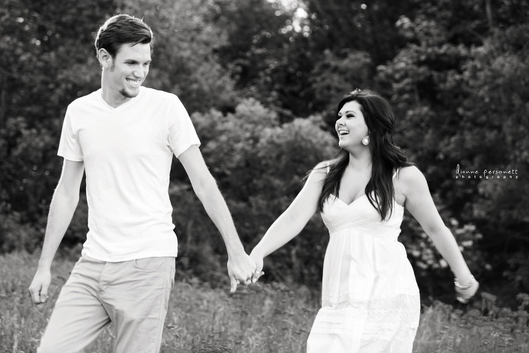 charlotte engagement photos in a flower field